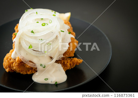 Snow Onion Chicken or Fried Chicken with Creamy Onions Sauce Snow Onion Chicken or Fried Chicken with Creamy Onions Sauce 116873361