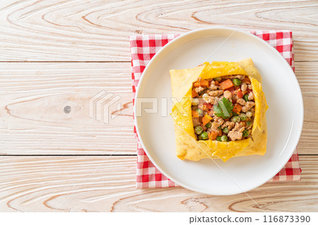 egg wrap or stuffed egg with minced pork and vegetable egg wrap or stuffed egg with minced pork and vegetable 116873390