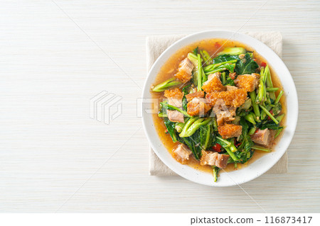 Stir-fried kale vegetable with crispy pork 116873417