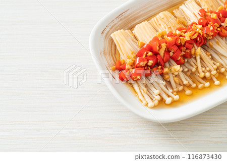 steamed golden needle mushroom or enokitake with soy sauce, chilli and garlic steamed golden needle mushroom or enokitake with soy sauce, chilli and garlic 116873430