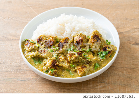 Afghani chicken in green curry or Hariyali tikka chicken hara masala with rice Afghani chicken in green curry or Hariyali tikka chicken hara masala with rice 116873633