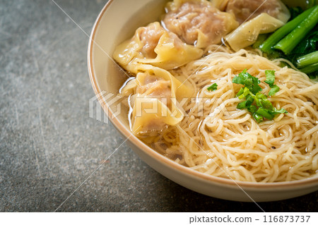 egg noodles with pork wonton soup or pork dumplings soup and vegetable 116873737