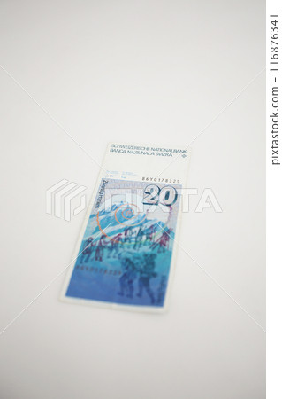 Photographed on a white background. A little old world money series Swiss franc 116876341
