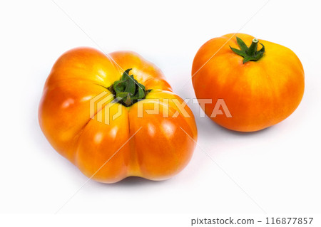 homemade tomatoes on a white background, close-up 116877857