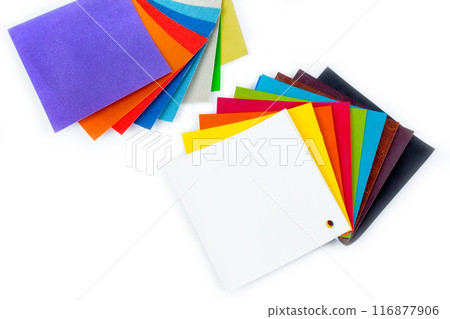colored samples of fabric on the background. place for text. top view colored samples of fabric on the background. place for text. top view 116877906