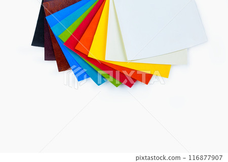 colored samples of fabric on the background. place for text. top view 116877907