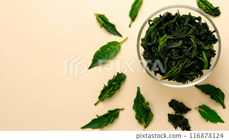 Green tea leaves background cream beige 116878124