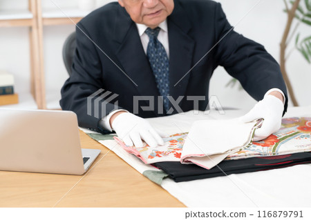 Man assessing recycling purchase 116879791