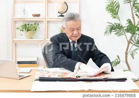 Man assessing recycling purchase 116879808