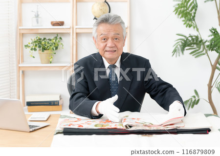 Man assessing recycling purchase Man assessing recycling purchase 116879809