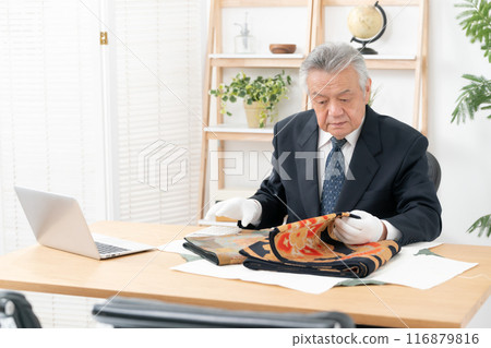 Man assessing recycling purchase 116879816