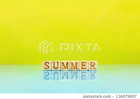 A bright yellow background with the English word SUMMER reflected on the water surface 116879887
