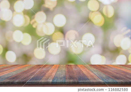 Empty wood table top with blur Christmas tree with bokeh light background 116882580