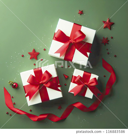 Three white gift boxes with red satin ribbons on a green background. Gifts for Christmas, New Year, Valentine's Day, Birthday 116883586