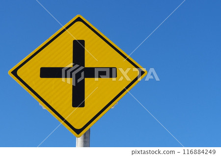Road sign There is a +-shaped road intersection 116884249