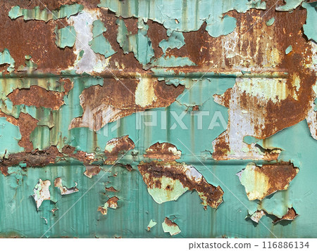 Background texture of scratched rusted steel with peeling paint Background texture of scratched rusted steel with peeling paint 116886134