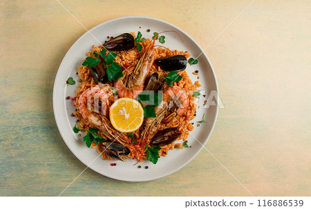 Seafood paella, shrimp and mussels risotto, rice, homemade, top view, no people, 116886539