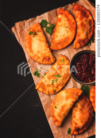 Fried mini pasties, with red sauce, top view, close-up, no people, selective focus, Fried mini pasties, with red sauce, top view, close-up, no people, selective focus, 116886574