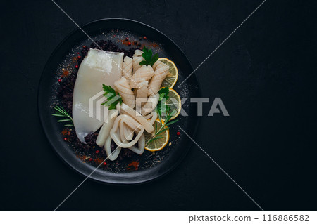 Fresh squid , raw, carcass, cut into rings, top view, no people, 116886582