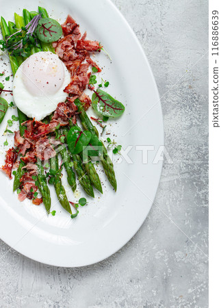 asparagus with poached egg and fried bacon, micro greens and spices, breakfast, homemade, no people, 116886639