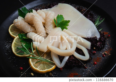 Fresh squid , raw, carcass, cut into rings, top view, no people, 116886670