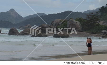 Couple Playing in Slow Motion on Lopes Mendes Beach, Brazil 116887042