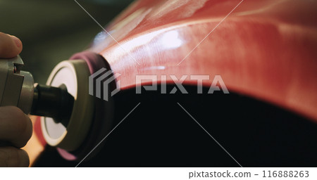 closeup red car polishing closeup red car polishing 116888263