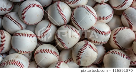 Pile of Baseballs with Red Stitching 116891870