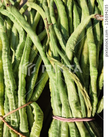 Long beans sell at morning wet market. fresh long beans are ready to cook 116894285