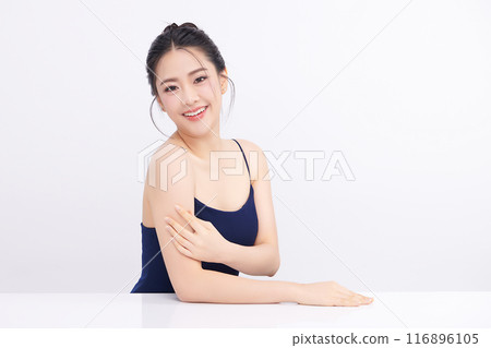 Beautiful young asian woman with clean fresh skin on white background, Face care, Facial treatment, Cosmetology, beauty and spa, Asian women portrait. Beautiful young asian woman with clean fresh skin on white background, Face care, Facial treatment, Cosmetology, beauty and spa, Asian women portrait. 116896105