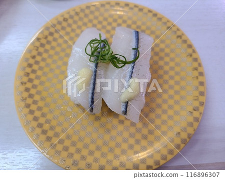 Handful of white fish Handful of white fish 116896307
