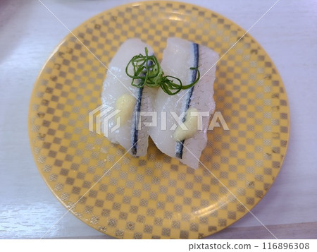 Handful of white fish Handful of white fish 116896308