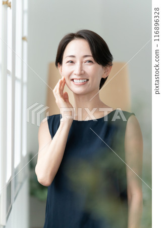 Woman touching her cheek beauty 116896328