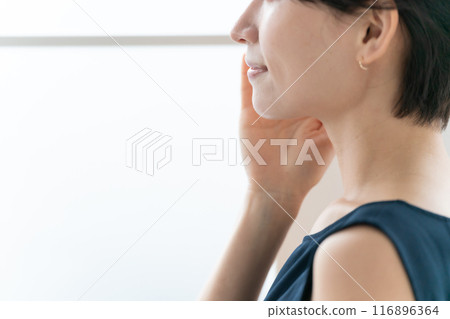 Woman touching her cheek beauty 116896364