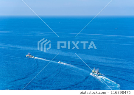 Purse seine fishing fleet leaving Toda fishing port for Suruga Bay 116898475