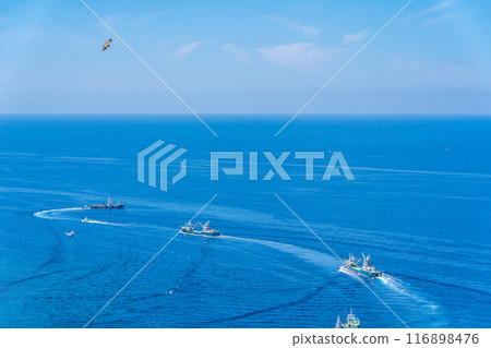 Purse seine fishing fleet leaving Toda fishing port for Suruga Bay Purse seine fishing fleet leaving Toda fishing port for Suruga Bay 116898476