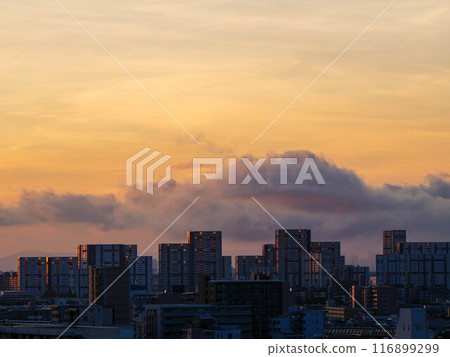 Dawn in the city. Looking out over the buildings of Ashiya City from a high-rise apartment building in Kobe City early in the morning 116899299