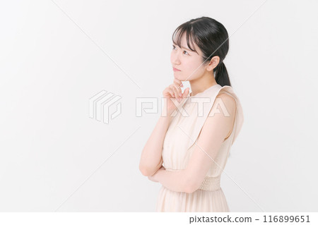 Young woman wearing a dress Young woman wearing a dress 116899651
