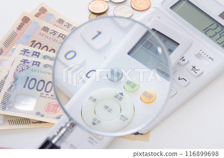 Air conditioner remote control and money 116899698