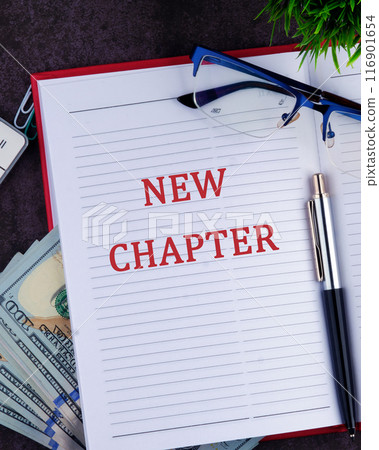 Text sign showing the NEW CHAPTER in a notebook, a vertical photo Text sign showing the NEW CHAPTER in a notebook, a vertical photo 116901654