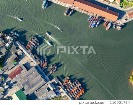 High angle view fisherman boats at the jetty located in Phuket Thailand, aerial view drone top down view,Siray fishing port Phuket Thailand 116901724