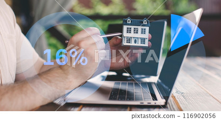 Down payment concept for real estate. Calculation on a laptop for a mortgage on a house Down payment concept for real estate. Calculation on a laptop for a mortgage on a house 116902056