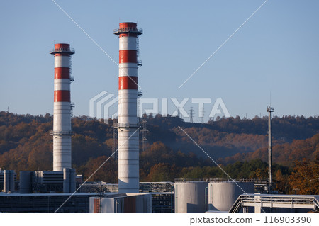 Power plant with two red and white pipes Power plant with two red and white pipes 116903390