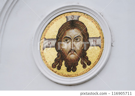 An intricate Byzantine mosaic of Jesus Christ on a circular base, illustrating ancient religious art on the Russian Orthodox Church 116905711