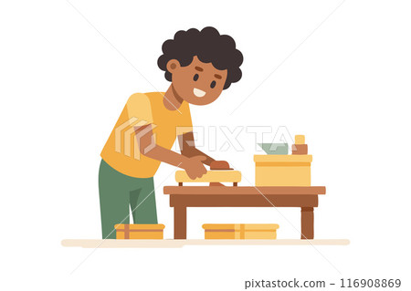 Smiling young boy wrapping gifts with care and joy at a table 116908869
