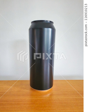 Black aluminium can on wooden table. Black aluminium can on wooden table. 116910213