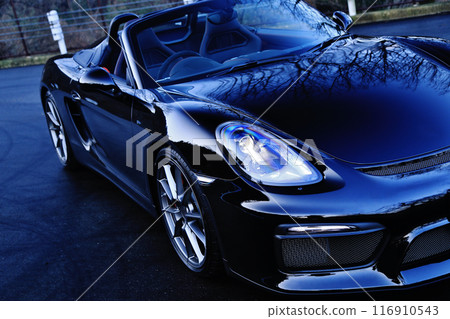 A shiny black convertible 116910543