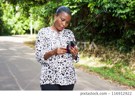 portrait of young woman ,smiling. 116912922