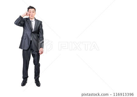 Sleepy businessman in suit in studio. White background. Sleepy businessman in suit in studio. White background. 116913396
