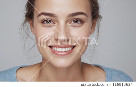 Perfect healthy white teeth smile of a young woman. Dental health or healthy skin concept for dental 116913624